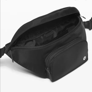 The Rest is Written belt bag in like new condition. Barely used.